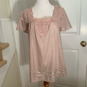 NWT, pretty light weight top with feminine detail